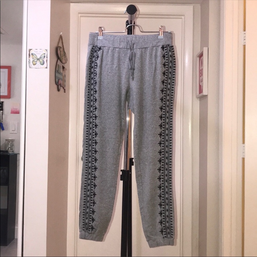 Grey joggers with navy blue design